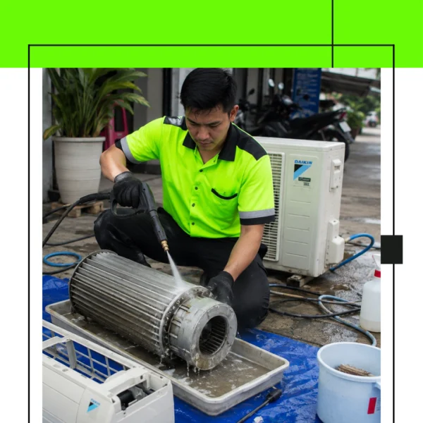 Teknisi AC Sedang Melakukan Overhaul AC di Jakarta